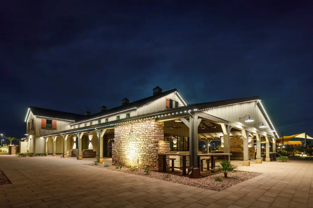Outdoor speakers integrated into a patio living space