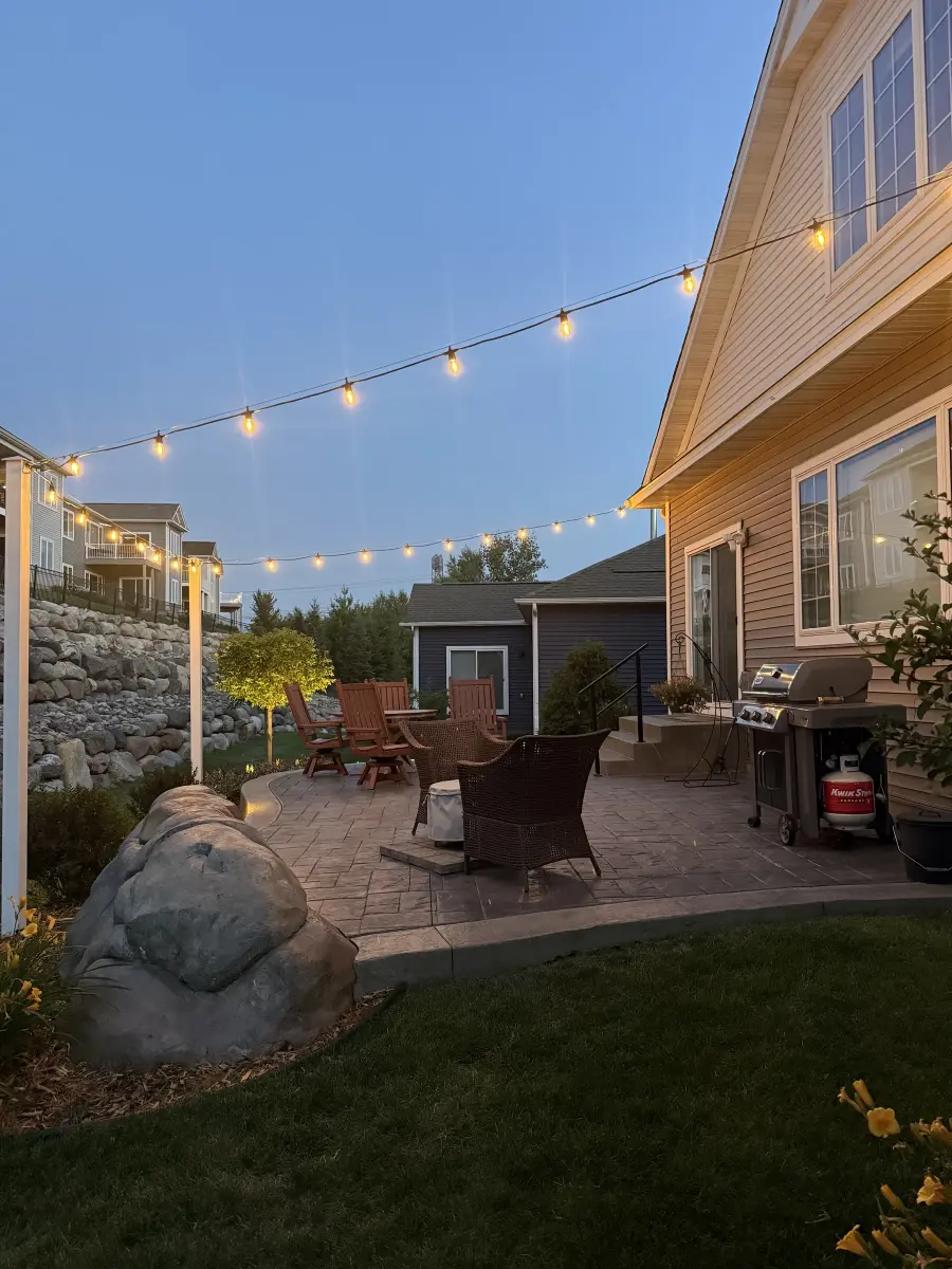 Bistro lighting over an outdoor living space