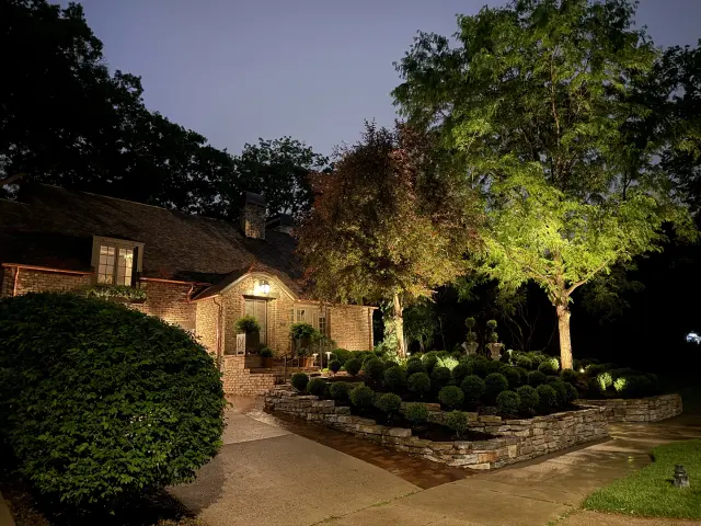 Layered landscape and architectural lighting at night